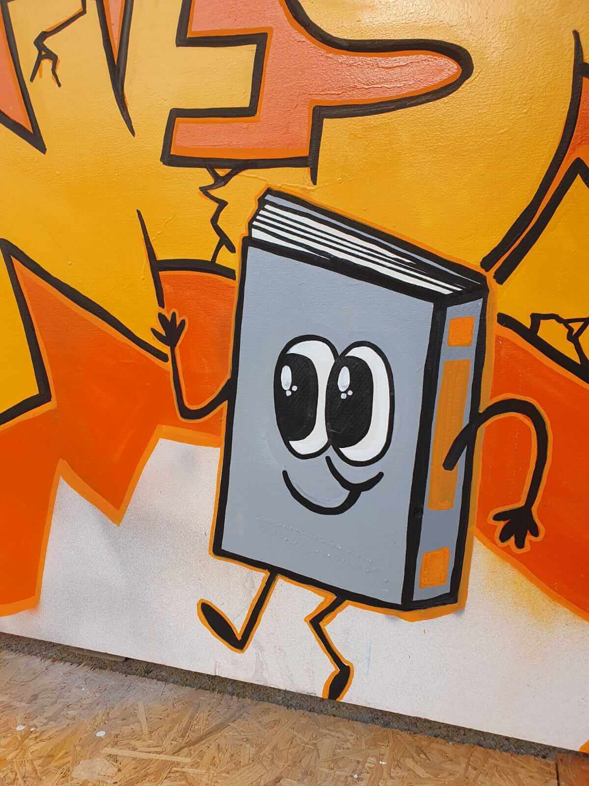 Personnage cartoon livre animé peint à la main - détail de la fresque murale lettering, Normandie